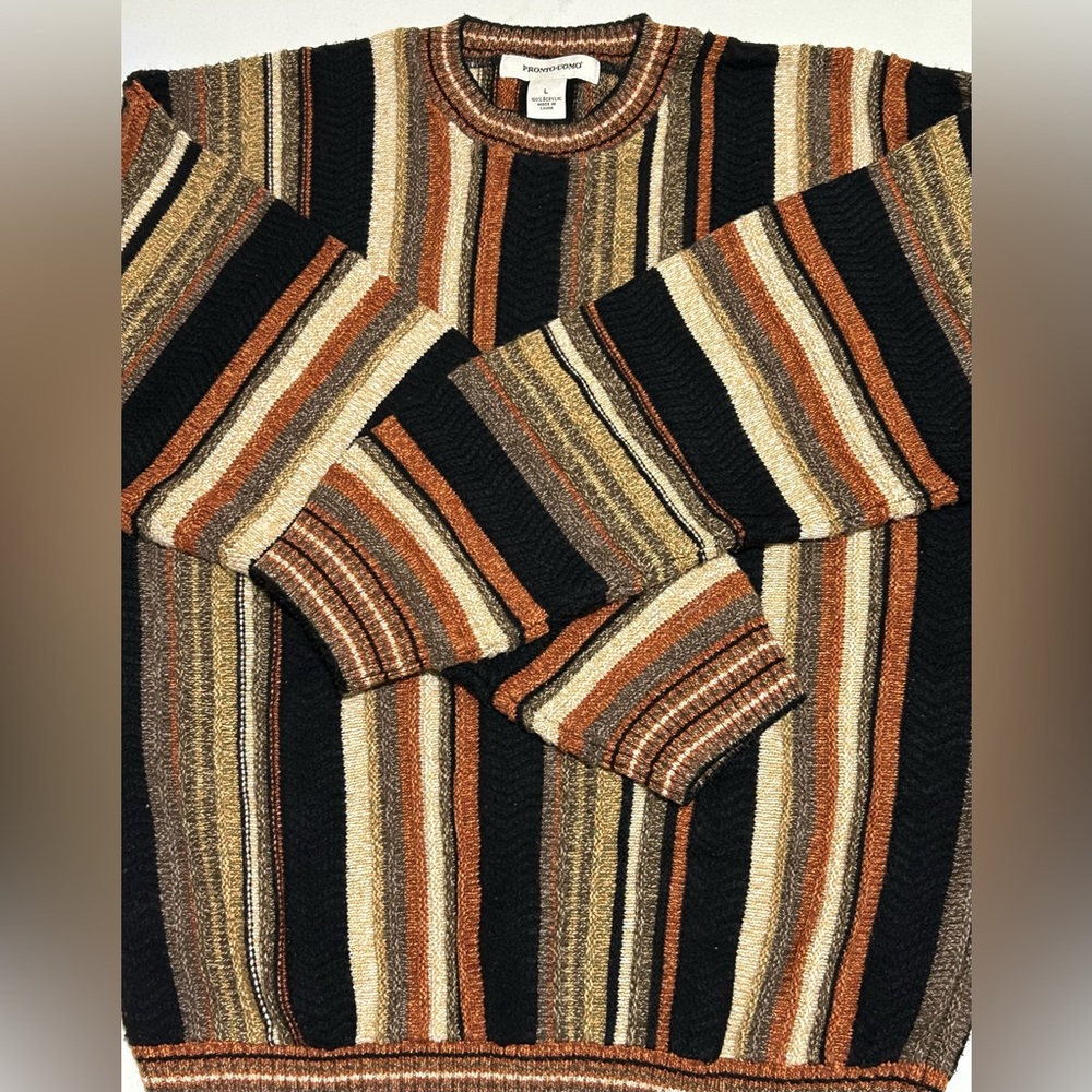 Stylish men’s knit sweater by Pronto Uomo. Multiple colors and intricate design.